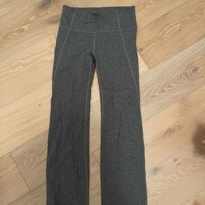 Athleta grey flare yoga pants size medium. Excellent condition. Barely worn.